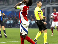 Bukayo Saka plays during the UEFA Champions League 2024/25 match between FC Internazionale and FC Arsenal at Stadio Giuseppe Meazza in Milan...