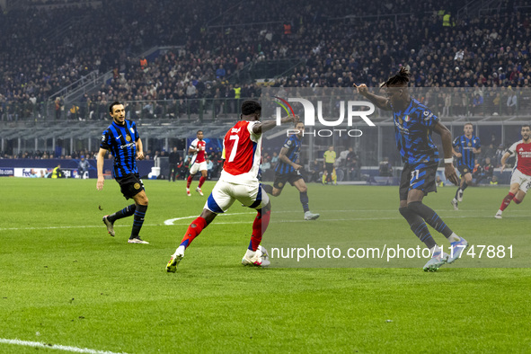 Bukayo Saka plays during the UEFA Champions League 2024/25 match between FC Internazionale and FC Arsenal at Stadio Giuseppe Meazza in Milan...