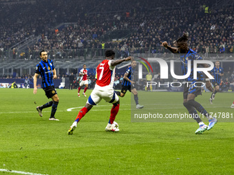 Bukayo Saka plays during the UEFA Champions League 2024/25 match between FC Internazionale and FC Arsenal at Stadio Giuseppe Meazza in Milan...