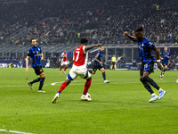 Bukayo Saka plays during the UEFA Champions League 2024/25 match between FC Internazionale and FC Arsenal at Stadio Giuseppe Meazza in Milan...