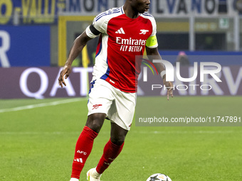 Bukayo Saka plays during the UEFA Champions League 2024/25 match between FC Internazionale and FC Arsenal at Stadio Giuseppe Meazza in Milan...