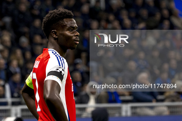 Bukayo Saka plays during the UEFA Champions League 2024/25 match between FC Internazionale and FC Arsenal at Stadio Giuseppe Meazza in Milan...