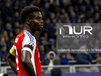 Bukayo Saka plays during the UEFA Champions League 2024/25 match between FC Internazionale and FC Arsenal at Stadio Giuseppe Meazza in Milan...