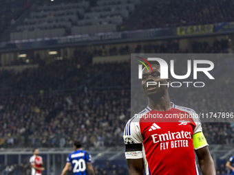 Bukayo Saka plays during the UEFA Champions League 2024/25 match between FC Internazionale and FC Arsenal at Stadio Giuseppe Meazza in Milan...