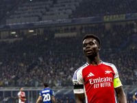 Bukayo Saka plays during the UEFA Champions League 2024/25 match between FC Internazionale and FC Arsenal at Stadio Giuseppe Meazza in Milan...