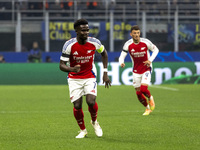 Bukayo Saka plays during the UEFA Champions League 2024/25 match between FC Internazionale and FC Arsenal at Stadio Giuseppe Meazza in Milan...