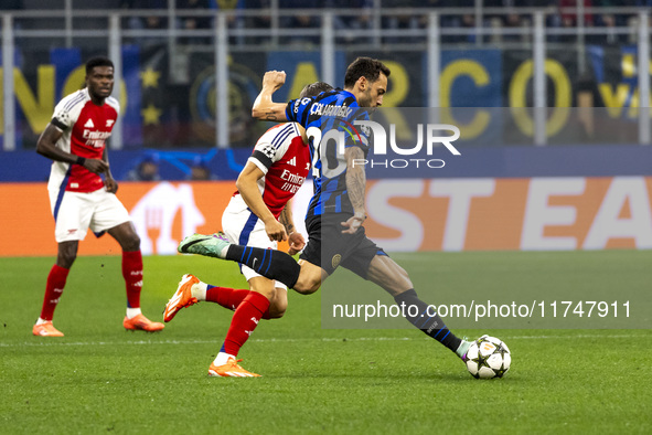 Hakan Calhanoglu plays during the UEFA Champions League 2024/25 match between FC Internazionale and FC Arsenal at Stadio Giuseppe Meazza in...