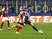 Hakan Calhanoglu plays during the UEFA Champions League 2024/25 match between FC Internazionale and FC Arsenal at Stadio Giuseppe Meazza in...