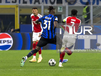 Yann Bisseck plays during the UEFA Champions League 2024/25 match between FC Internazionale and FC Arsenal in Milano, Italy, on November 6,...