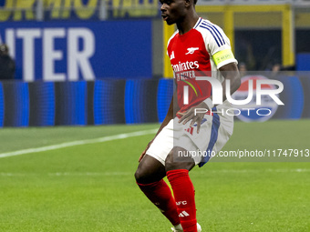 Bukayo Saka plays during the UEFA Champions League 2024/25 match between FC Internazionale and FC Arsenal at Stadio Giuseppe Meazza in Milan...