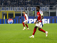 Bukayo Saka plays during the UEFA Champions League 2024/25 match between FC Internazionale and FC Arsenal at Stadio Giuseppe Meazza in Milan...