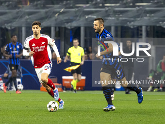 Stefan De Vrij plays during the UEFA Champions League 2024/25 match between FC Internazionale and FC Arsenal at Stadio Giuseppe Meazza in Mi...