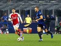 Stefan De Vrij plays during the UEFA Champions League 2024/25 match between FC Internazionale and FC Arsenal at Stadio Giuseppe Meazza in Mi...