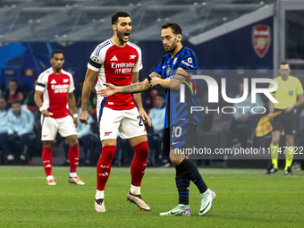 Lautaro Martinez and Mikel Merino are in action during the UEFA Champions League 2024/25 match between FC Internazionale and FC Arsenal in M...