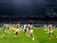 Arsenal warms up before the UEFA Champions League 2024/25 match between FC Internazionale and FC Arsenal at Stadio Giuseppe Meazza in Milano...