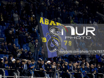 Inter supporters are present during the UEFA Champions League 2024/25 match between FC Internazionale and FC Arsenal at Stadio Giuseppe Meaz...