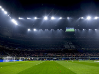 Arsenal warms up before the UEFA Champions League 2024/25 match between FC Internazionale and FC Arsenal at Stadio Giuseppe Meazza in Milano...