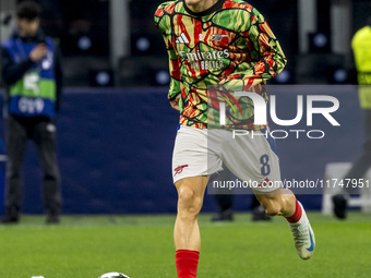 Martin Odegaard plays during the UEFA Champions League 2024/25 match between FC Internazionale and FC Arsenal at Stadio Giuseppe Meazza in M...