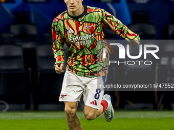 Martin Odegaard plays during the UEFA Champions League 2024/25 match between FC Internazionale and FC Arsenal at Stadio Giuseppe Meazza in M...