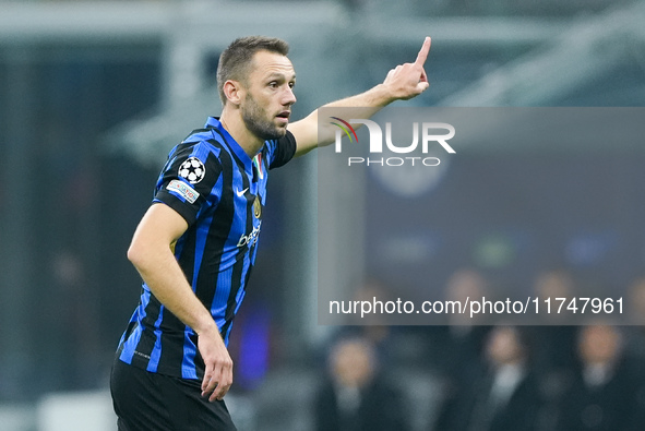 Stefan de Vrij of FC Internazionale gestures  during the UEFA Champions League 2024/25 League Phase MD4 match between FC Internazionale and...