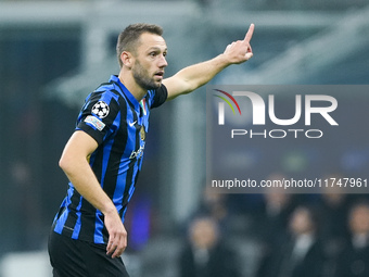 Stefan de Vrij of FC Internazionale gestures  during the UEFA Champions League 2024/25 League Phase MD4 match between FC Internazionale and...