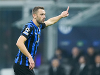 Stefan de Vrij of FC Internazionale gestures  during the UEFA Champions League 2024/25 League Phase MD4 match between FC Internazionale and...