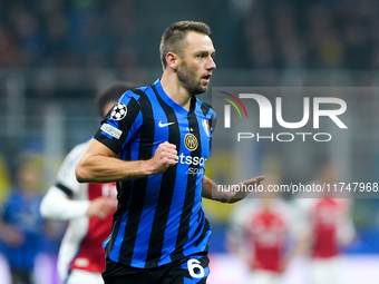 Stefan de Vrij of FC Internazionale gestures during the UEFA Champions League 2024/25 League Phase MD4 match between FC Internazionale and A...