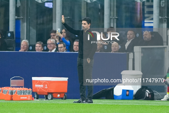 Mikel Arteta Head Coach of Arsenal gestures during the UEFA Champions League 2024/25 League Phase MD4 match between FC Internazionale and Ar...