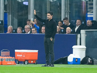 Mikel Arteta Head Coach of Arsenal gestures during the UEFA Champions League 2024/25 League Phase MD4 match between FC Internazionale and Ar...