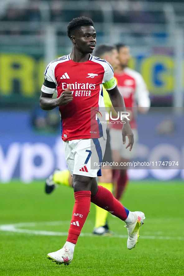 Bukayo Saka of Arsenal looks on during the UEFA Champions League 2024/25 League Phase MD4 match between FC Internazionale and Arsenal at Sta...