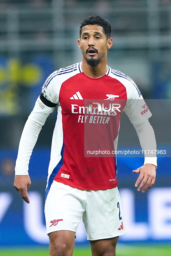 William Saliba of Arsenal looks on during the UEFA Champions League 2024/25 League Phase MD4 match between FC Internazionale and Arsenal at...