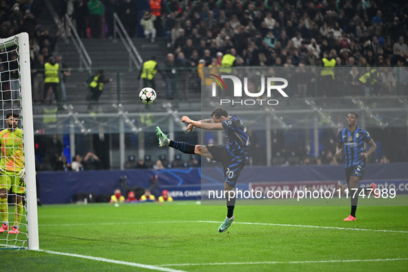 Marcus Thuram of FC Inter celebrates after a penalty during the UEFA Champions League stage match Phase MD4 between Inter FC Internazionale...