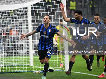 Marcus Thuram of FC Inter celebrates after a penalty during the UEFA Champions League stage match Phase MD4 between Inter FC Internazionale...