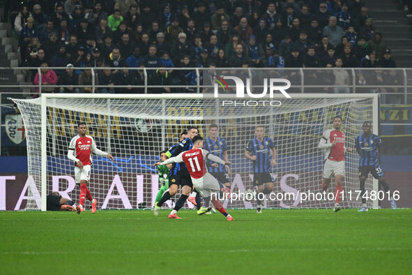 Gabriel Martinelli of Arsenal F.C. is in action during the UEFA Champions League 2024/25 League Phase MD4 match between F.C. Inter and Arsen...