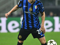 Benjamin Pavard of F.C. Inter is in action during the UEFA Champions League 2024/25 League Phase MD4 match between F.C. Inter and Arsenal F....