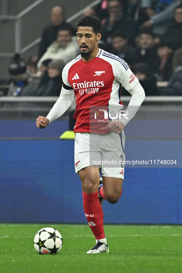 William Saliba of Arsenal F.C. is in action during the UEFA Champions League 2024/25 League Phase MD4 match between F.C. Inter and Arsenal F...