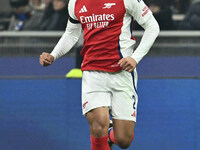 William Saliba of Arsenal F.C. is in action during the UEFA Champions League 2024/25 League Phase MD4 match between F.C. Inter and Arsenal F...