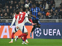 Yann Aurel Bisseck of F.C. Inter is in action during the UEFA Champions League 2024/25 League Phase MD4 match between F.C. Inter and Arsenal...