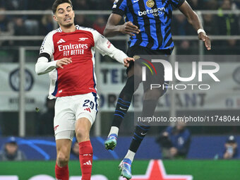 Kai Havertz of Arsenal F.C. and Yann Aurel Bisseck of F.C. Inter are in action during the UEFA Champions League 2024/25 League Phase MD4 mat...