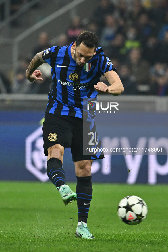 Hakan Calhanoglu of F.C. Inter is in action during the UEFA Champions League 2024/25 League Phase MD4 match between F.C. Inter and Arsenal F...