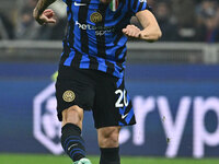 Hakan Calhanoglu of F.C. Inter is in action during the UEFA Champions League 2024/25 League Phase MD4 match between F.C. Inter and Arsenal F...