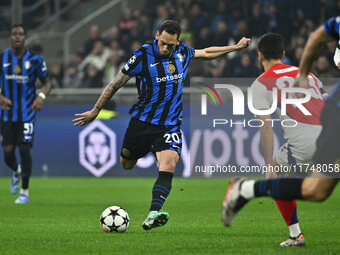 Hakan Calhanoglu of F.C. Inter is in action during the UEFA Champions League 2024/25 League Phase MD4 match between F.C. Inter and Arsenal F...