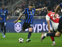 Hakan Calhanoglu of F.C. Inter is in action during the UEFA Champions League 2024/25 League Phase MD4 match between F.C. Inter and Arsenal F...