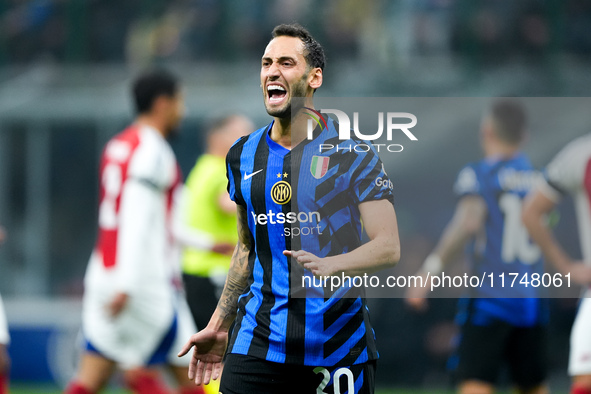 Hakan Calhanoglu of FC Internazionale yells during the UEFA Champions League 2024/25 League Phase MD4 match between FC Internazionale and Ar...