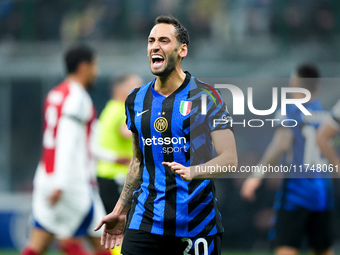 Hakan Calhanoglu of FC Internazionale yells during the UEFA Champions League 2024/25 League Phase MD4 match between FC Internazionale and Ar...