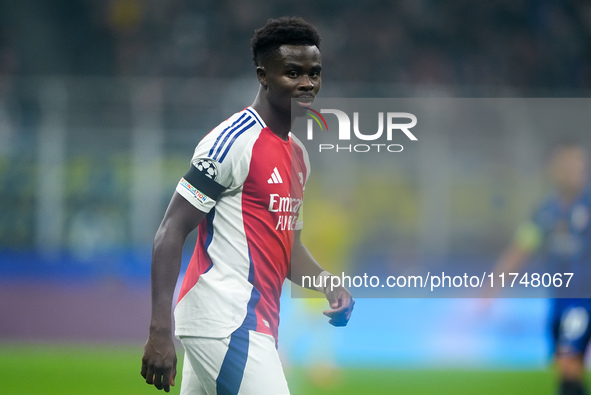 Bukayo Saka of Arsenal looks on during the UEFA Champions League 2024/25 League Phase MD4 match between FC Internazionale and Arsenal at Sta...