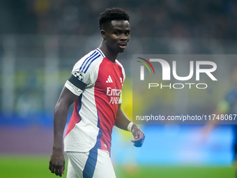 Bukayo Saka of Arsenal looks on during the UEFA Champions League 2024/25 League Phase MD4 match between FC Internazionale and Arsenal at Sta...