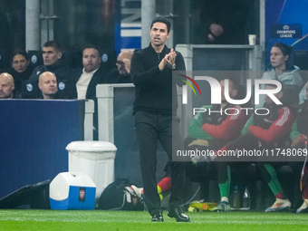 Mikel Arteta Head Coach of Arsenal gestures during the UEFA Champions League 2024/25 League Phase MD4 match between FC Internazionale and Ar...