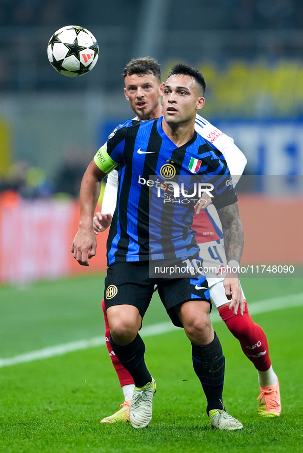 Lautaro Martinez of FC Internazionale and Ben White of Arsenal compete for the ball during the UEFA Champions League 2024/25 League Phase MD...