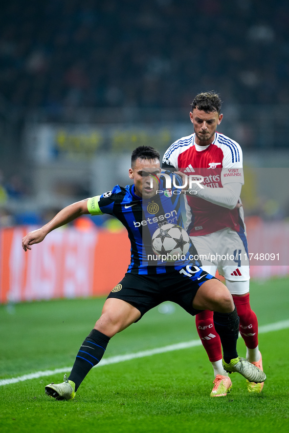 Lautaro Martinez of FC Internazionale and Ben White of Arsenal compete for the ball during the UEFA Champions League 2024/25 League Phase MD...